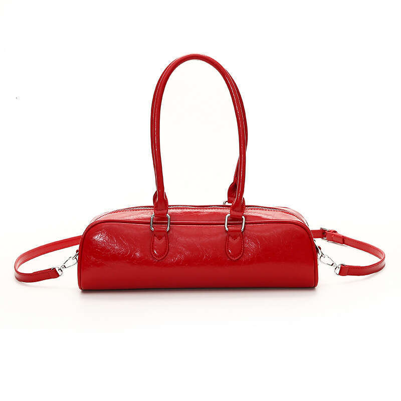 Bowling women 2025 summer new item, high-end soft leather heart shoulder for women, French stick bag