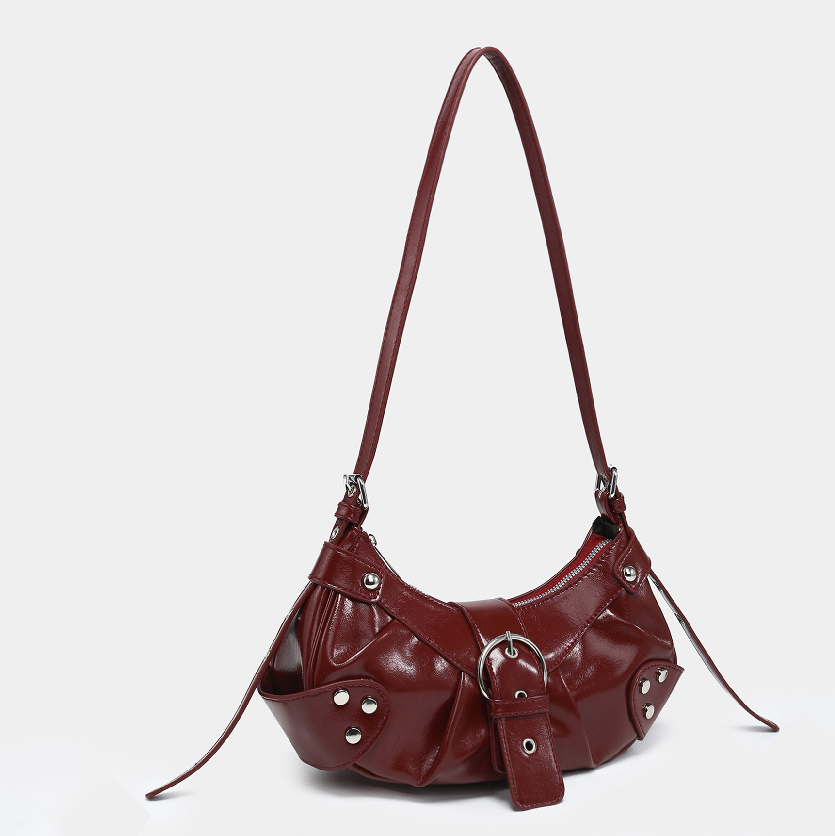 Fashionable motorcycle bag underarm bag rivet tassel high-end pleated women's bag single shoulder bag