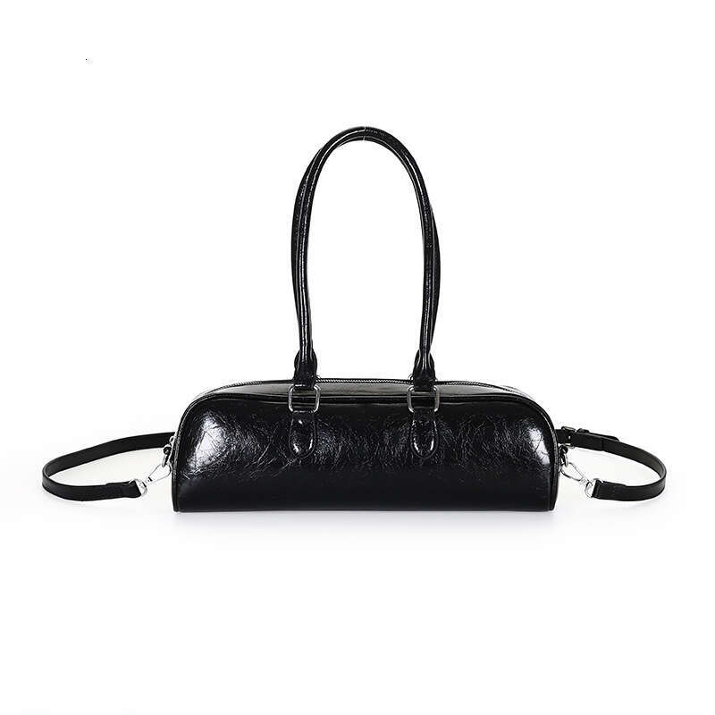 Bowling women 2025 summer new item, high-end soft leather heart shoulder for women, French stick bag