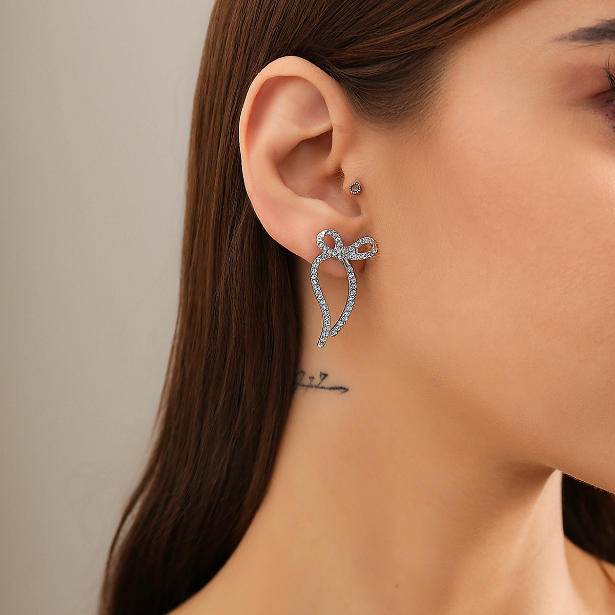 Hot selling BowEarring bow earrings, niche metal ribbon knots, French minimalist earrings