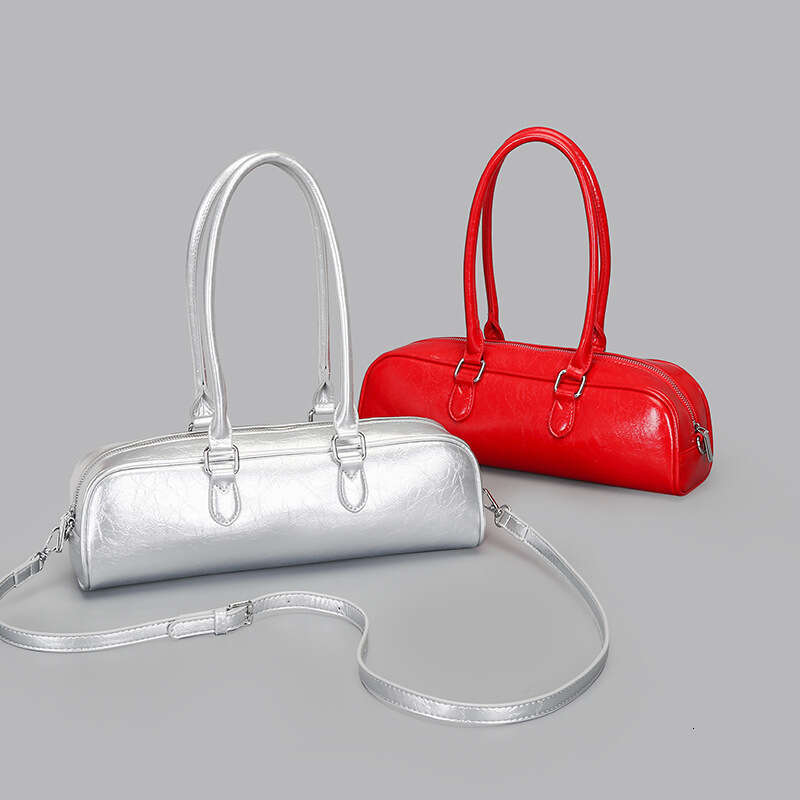 Bowling women 2025 summer new item, high-end soft leather heart shoulder for women, French stick bag