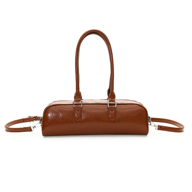 Bowling women 2025 summer new item, high-end soft leather heart shoulder for women, French stick bag
