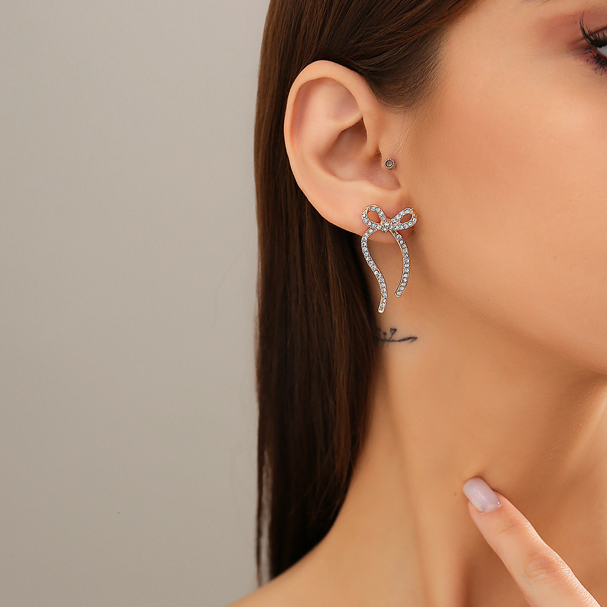Hot selling BowEarring bow earrings, niche metal ribbon knots, French minimalist earrings