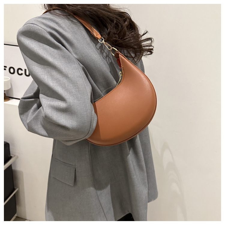 Solid color texture light luxury hand-held crescent retro shoulder bag
