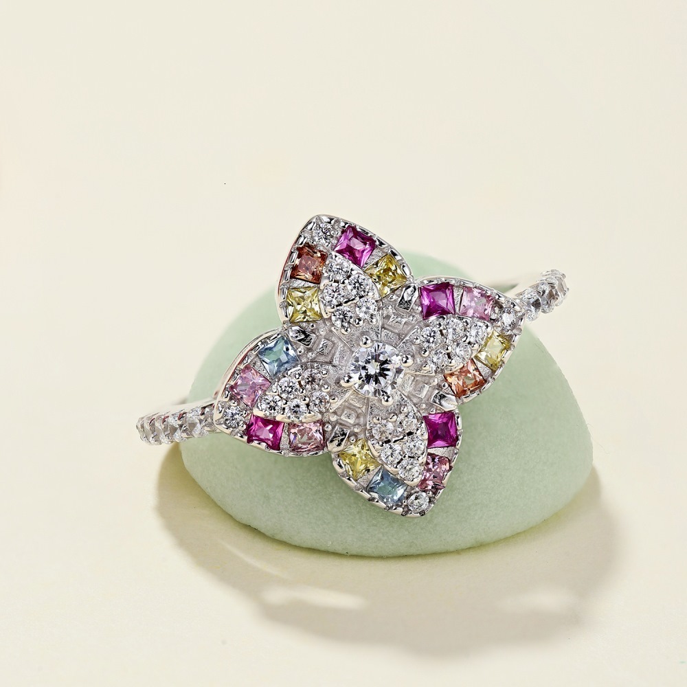 S sterg sier zircon inlaid with candy colored clover design for a refined and elegant closed mouth ring