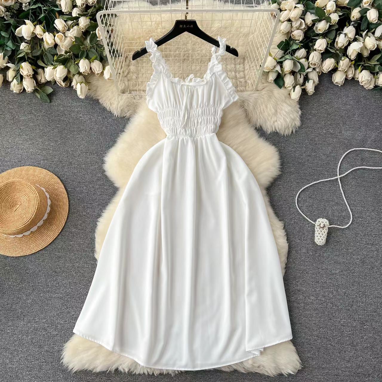 High end vacation dress for women designed with a heartfelt machine hollowed out elastic slim fit long slit over knee skirt beach skirt