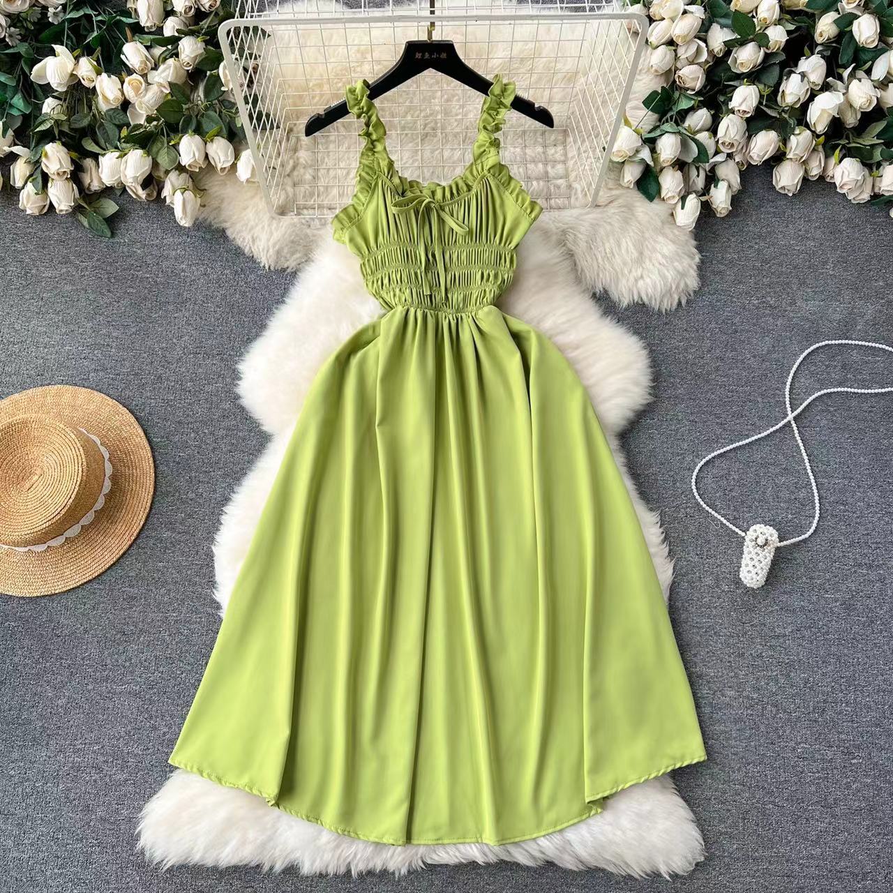High end vacation dress for women designed with a heartfelt machine hollowed out elastic slim fit long slit over knee skirt beach skirt