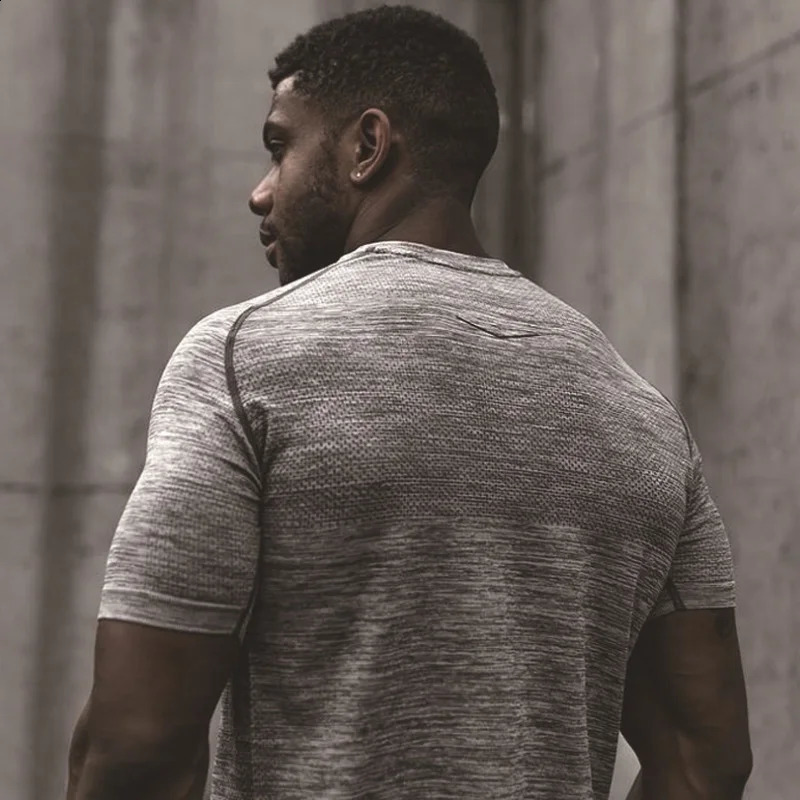 Mens summer gym sports running short sleeved Tshirt fitness mens bodybuilding muscle casual top quick drying exercise clothing 240827
