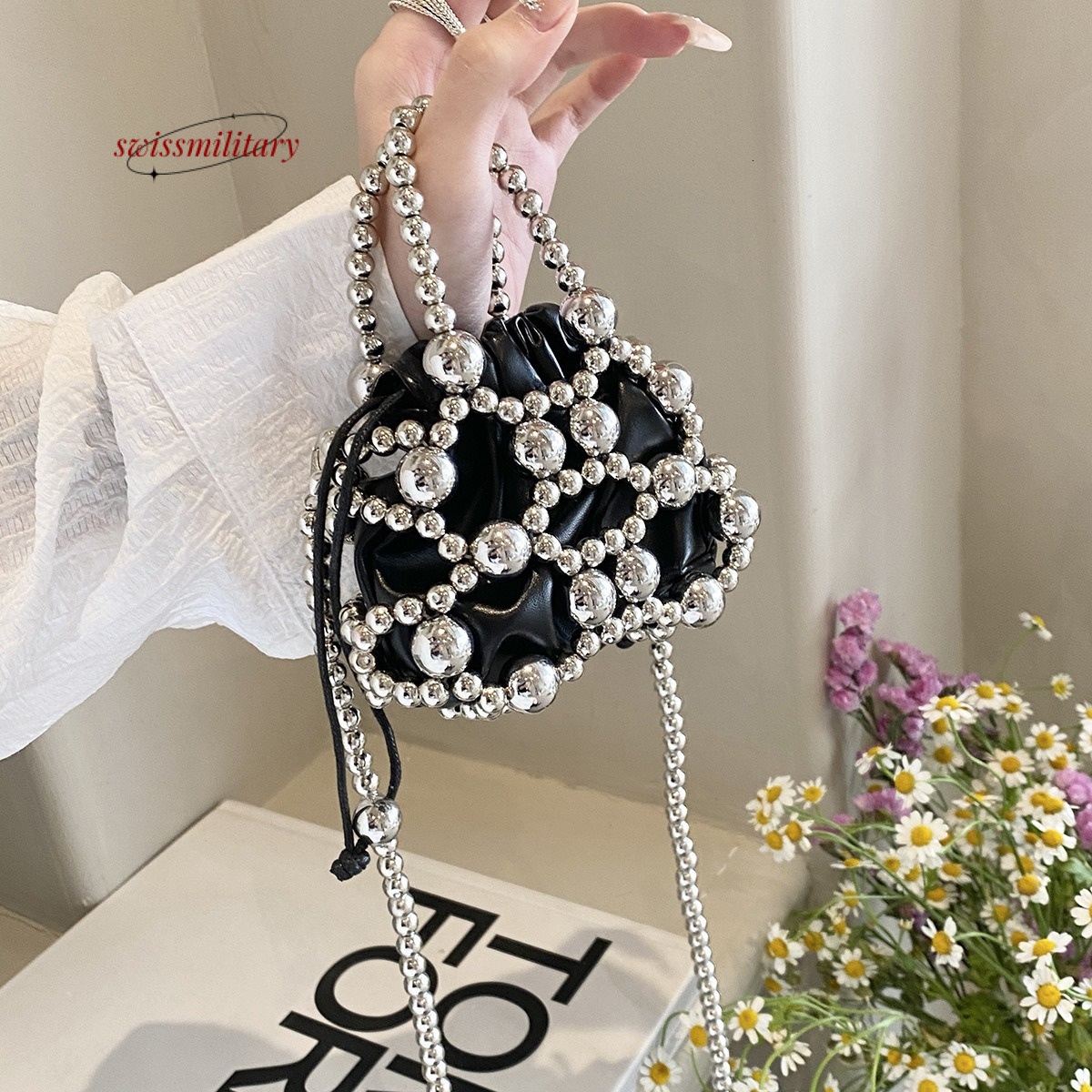 Swissmilitary Small high-end spherical hardware handbag with 2024 summer trend, featuring drawstring design and a stylish woven crossbody bag #22
