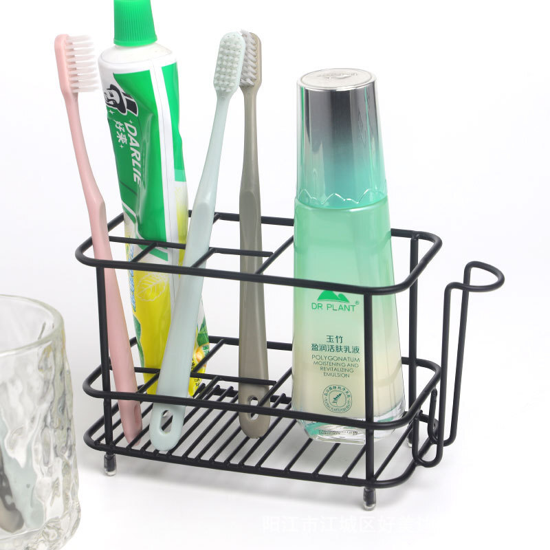Creative stainless steel non perforated bathroom toothpaste holder electric toothbrush storage rack