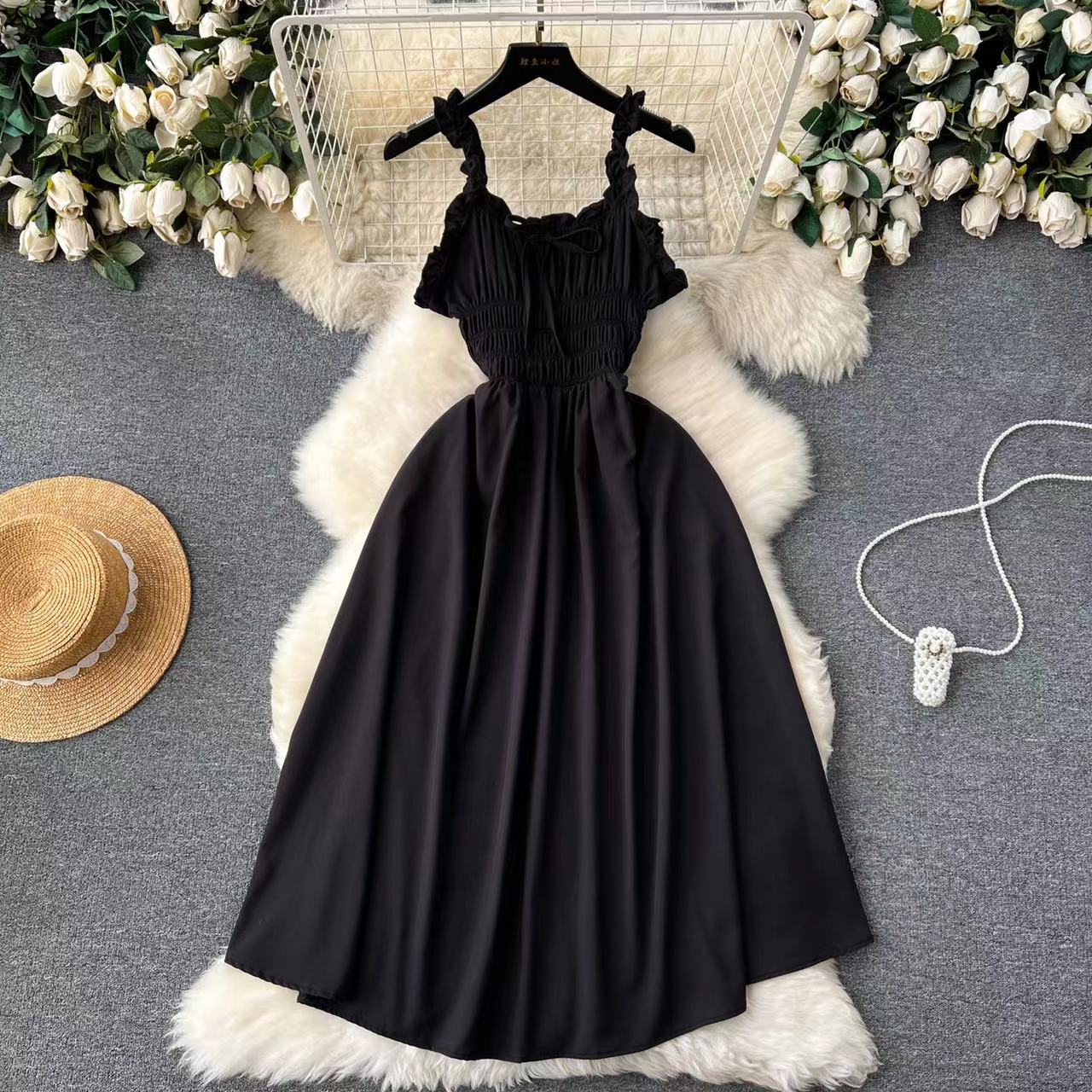 High end vacation dress for women designed with a heartfelt machine hollowed out elastic slim fit long slit over knee skirt beach skirt