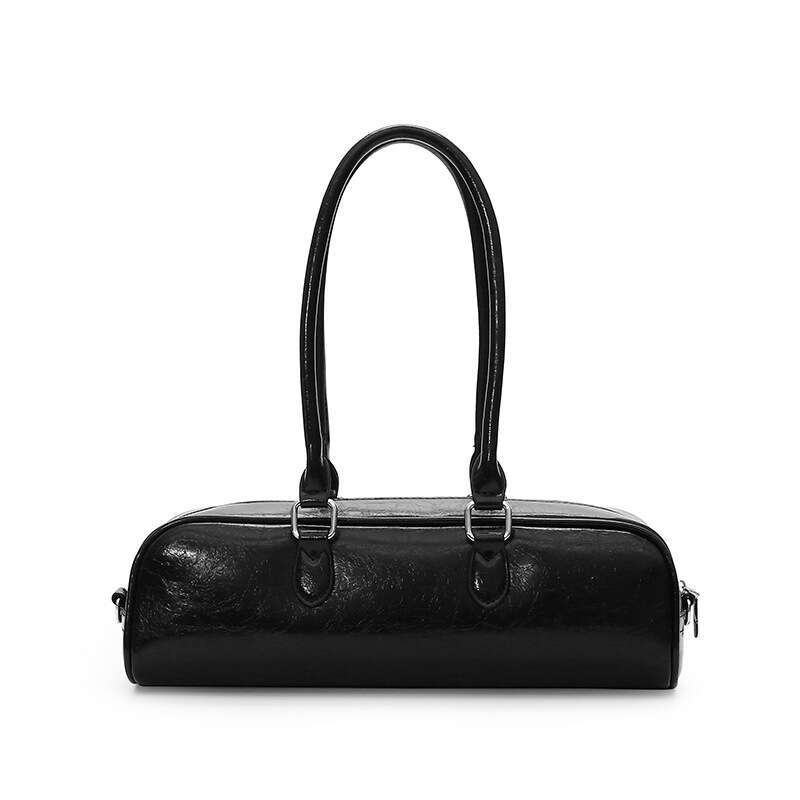 Bowling women 2025 summer new item, high-end soft leather heart shoulder for women, French stick bag