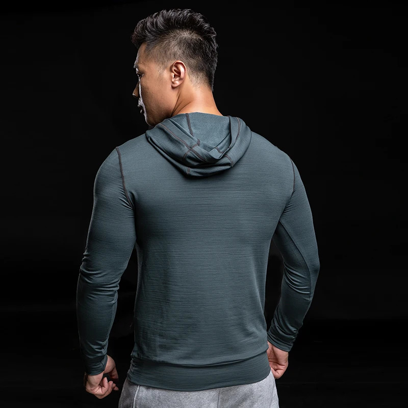 Gym mens Tshirt long sleeved slim fit top elastic sports fitness autumn and winter comfortable breathable quick drying hoodie 240827