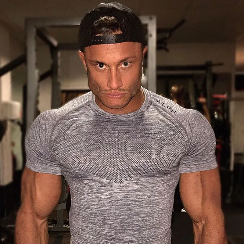 Mens summer gym sports running short sleeved Tshirt fitness mens bodybuilding muscle casual top quick drying exercise clothing 240827