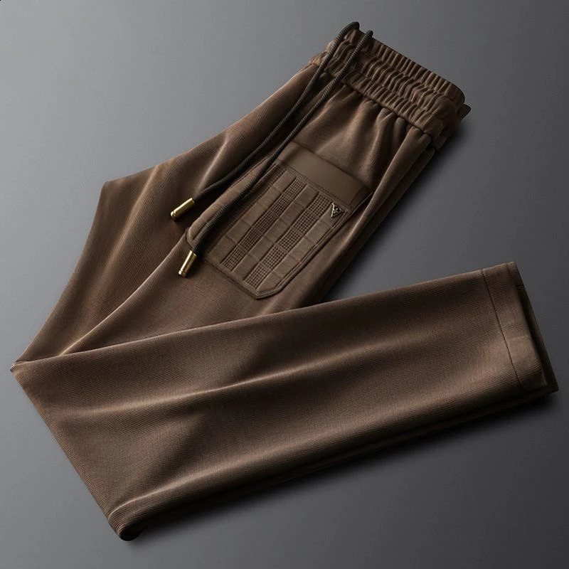 High end letter embossed embroidery casual mens pants spring and summer trend loose fit suitable for sports mens pants 240828