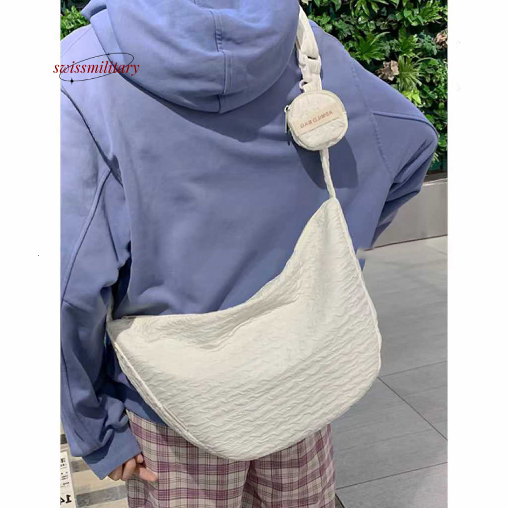 Swissmilitary Summer new small fresh sweet dumpling bag, versatile crossbody for women, large capacity commuting, niche, and high aesthetic value bag 
