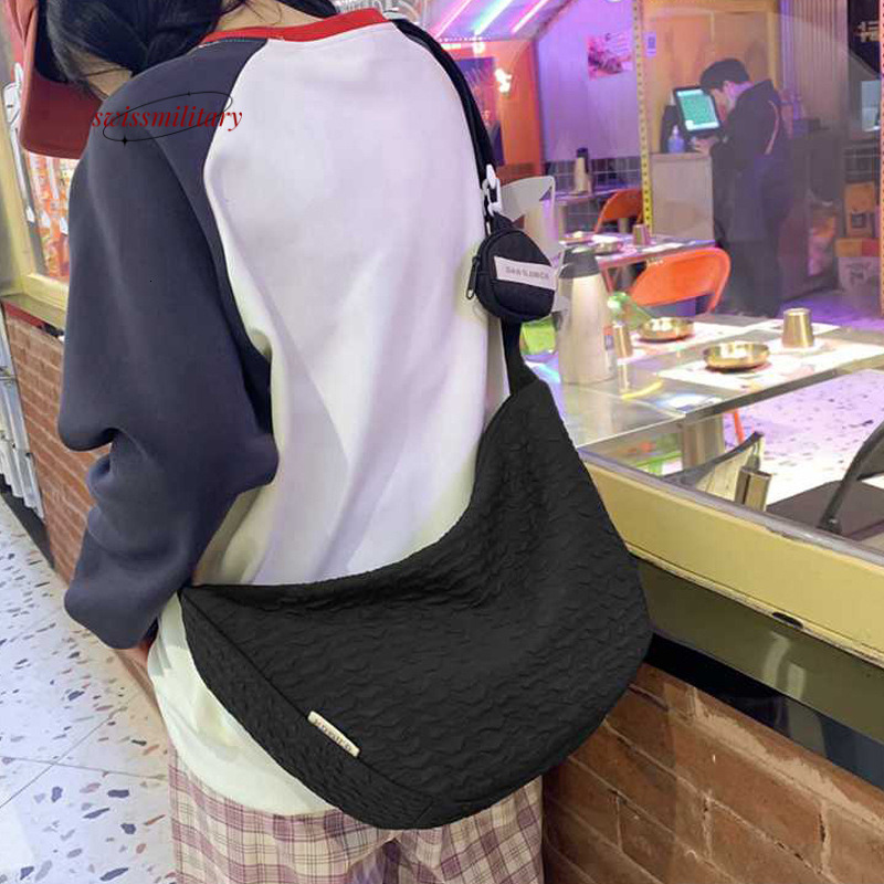 Swissmilitary Summer new small fresh sweet dumpling bag, versatile crossbody for women, large capacity commuting, niche, and high aesthetic value bag 