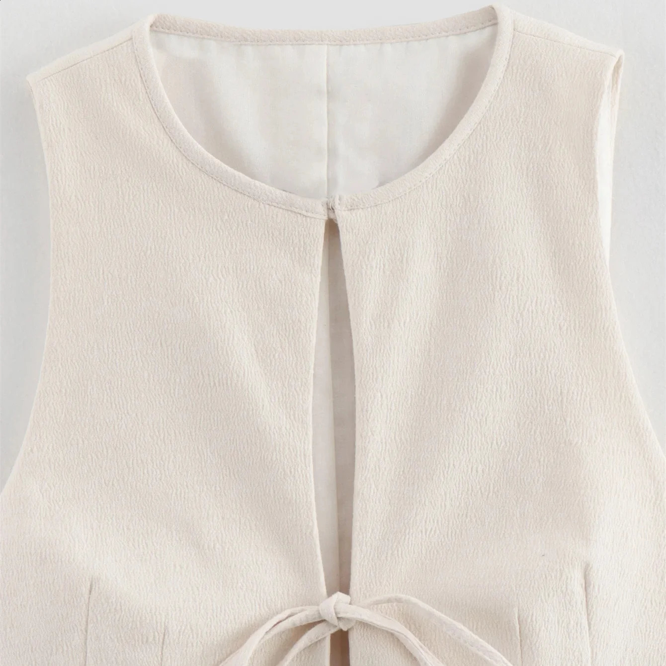 Womens elegant beige cut vest lace O-neck fashionable womens sleeveless tie front casual cardigan top 240828