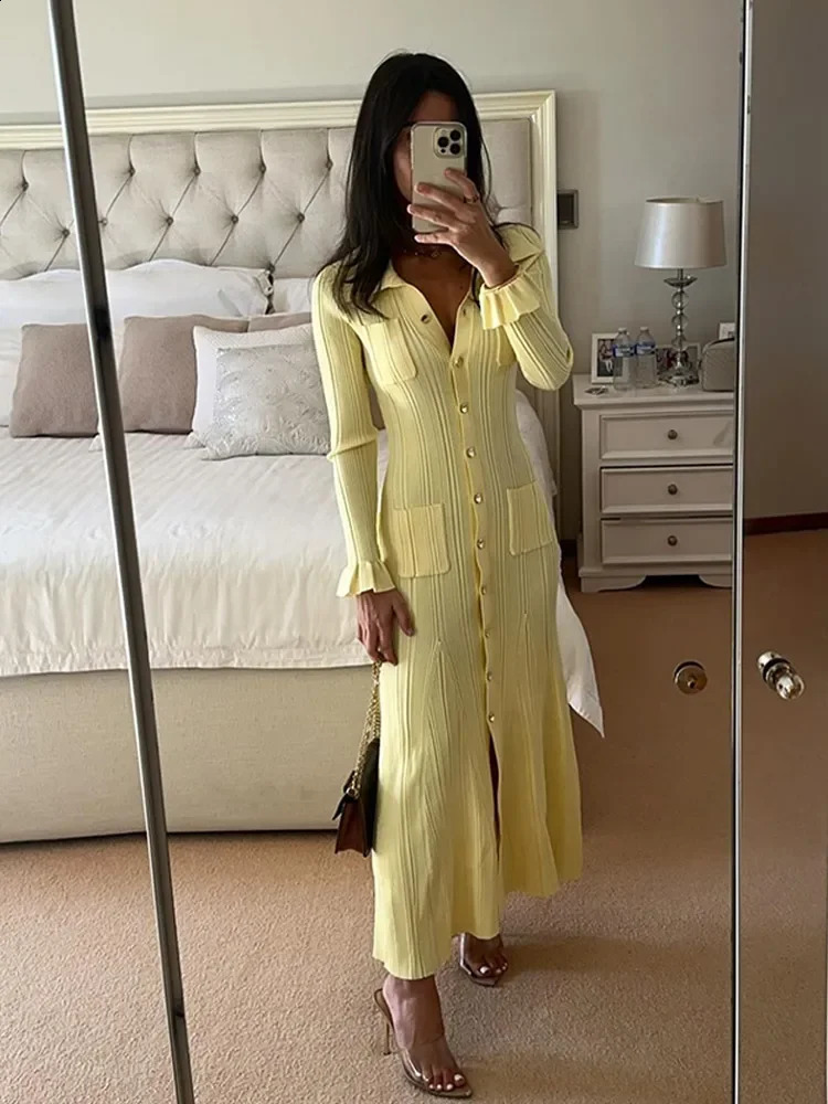 Knitted elegant yellow single breasted button up dress for women featuring a unique lapel and full sleeves with ruffled hem long skirt for womens offi