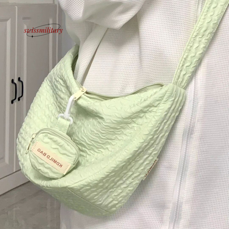 Swissmilitary Summer new small fresh sweet dumpling bag, versatile crossbody for women, large capacity commuting, niche, and high aesthetic value bag 