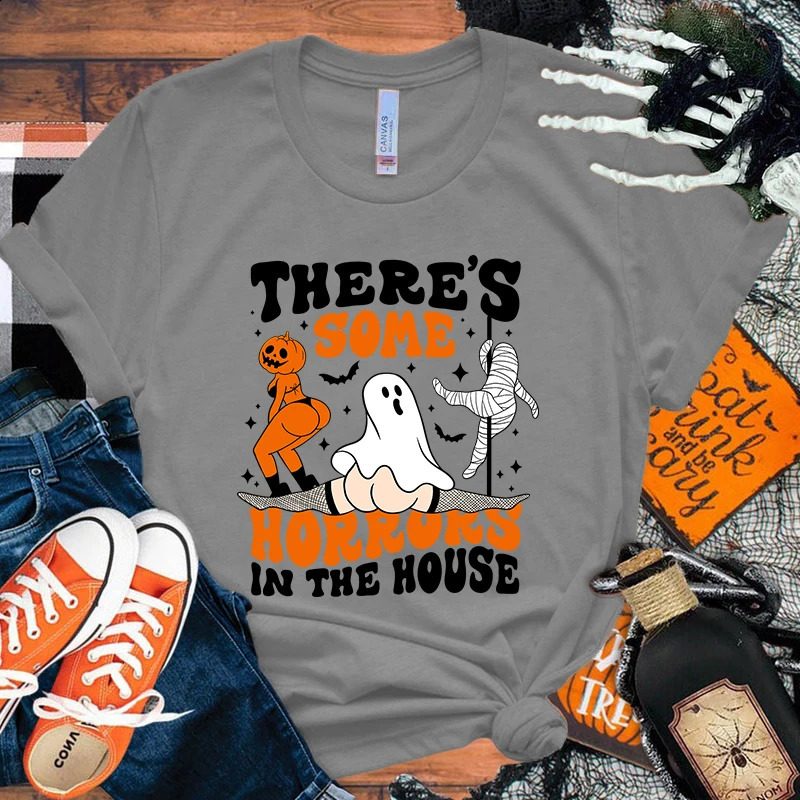 There are some horror printed T-shirts in the Halloween house summer casual loose T-shirts womens Harajuku shirts 240829