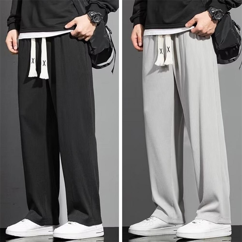 Casual sports pants mens casual pants solid color brushed elastic waist loose fit suitable for pants 240828
