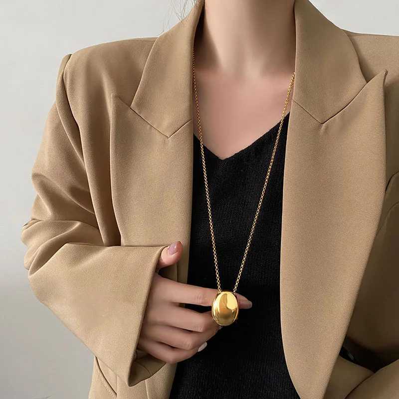 Smooth oval shaped droplet pendant necklace made of metal suitable for women girls stainless steel long coats necklaces and charming jewelry gifts W24