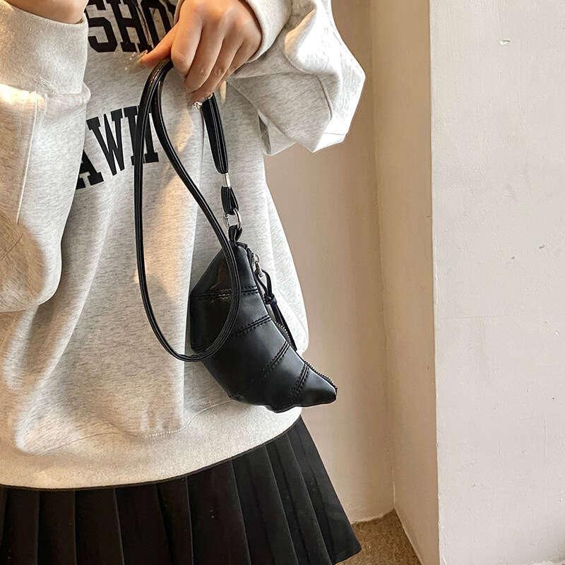 Niche design, high-end mini cowhorn bag in 2024, new exquisite hand-held strap, zero wallet for women