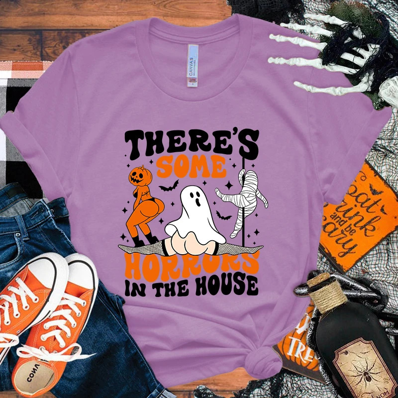 There are some horror printed T-shirts in the Halloween house summer casual loose T-shirts womens Harajuku shirts 240829