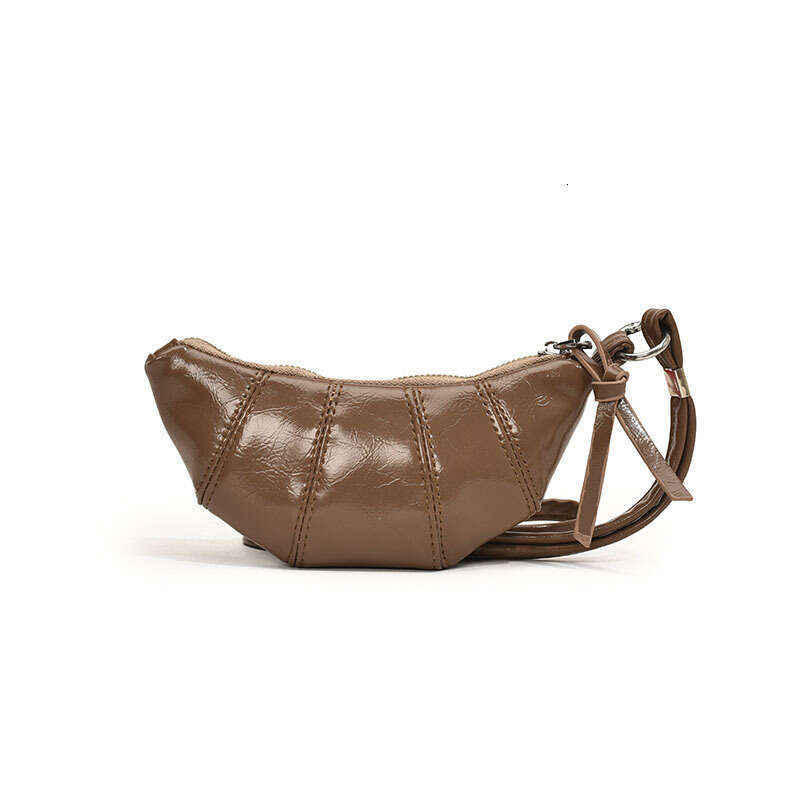 Niche design, high-end mini cowhorn bag in 2024, new exquisite hand-held strap, zero wallet for women