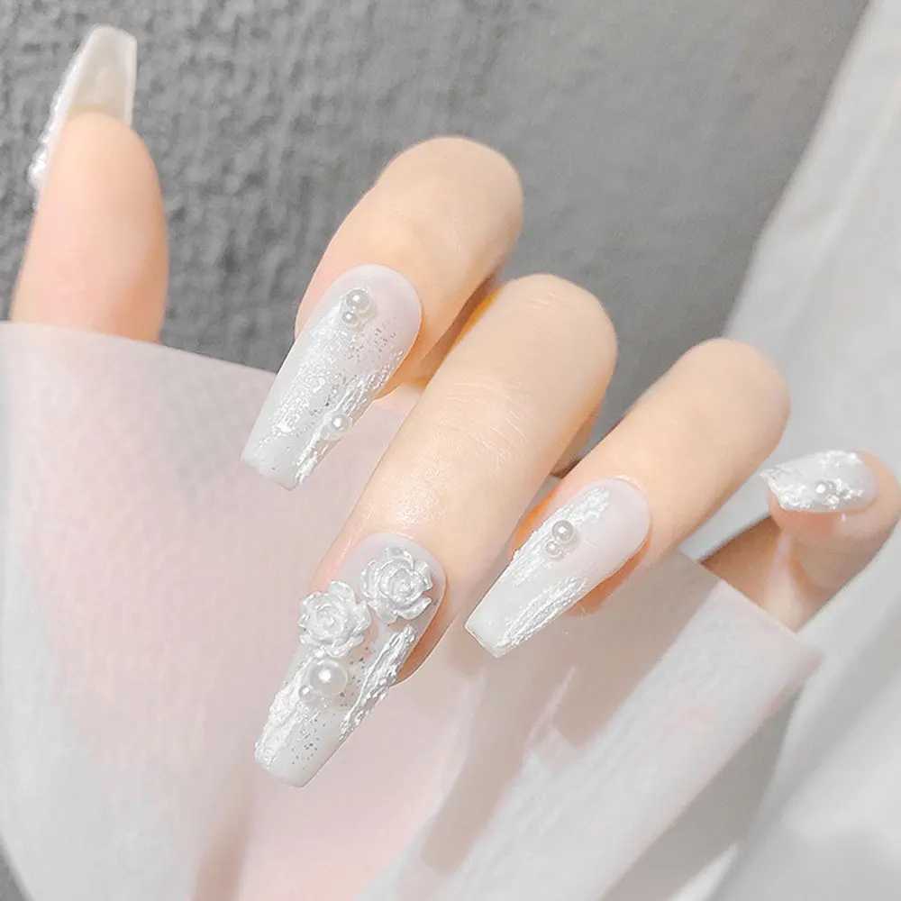A box of 3D floral nail art decoration tea flower rhinestone crystal nail charm parts for DIY nail accessories in France W240829