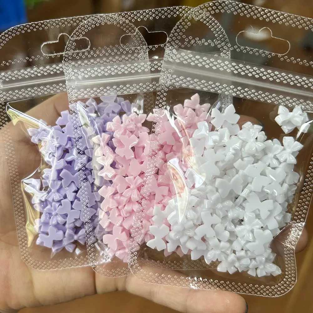 50/100 pieces of pink and white Kawaii bow nail charm 3D resin bow knot flat back nail gemstone 8 * 10mm nail art rhinestone jewelry #Bowtie W240829