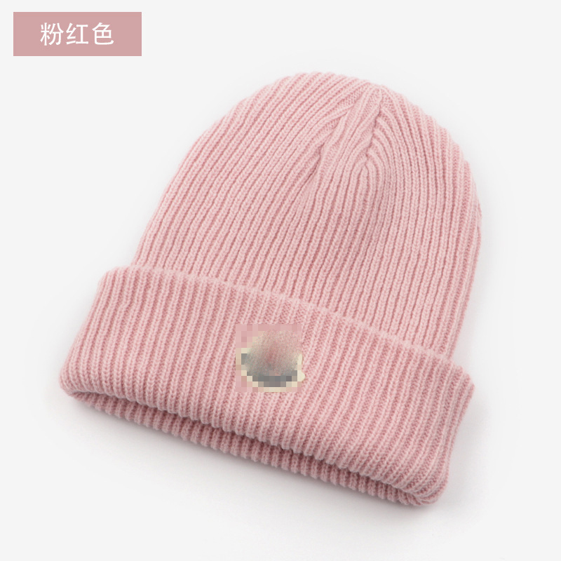 Factory direct wholesale extended padded knitted hats for men and women winter warm wool hats outdoor windproof hats