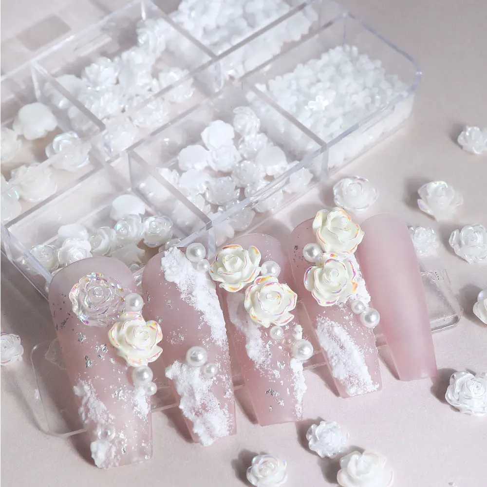 A box of 3D floral nail art decoration tea flower rhinestone crystal nail charm parts for DIY nail accessories in France W240829