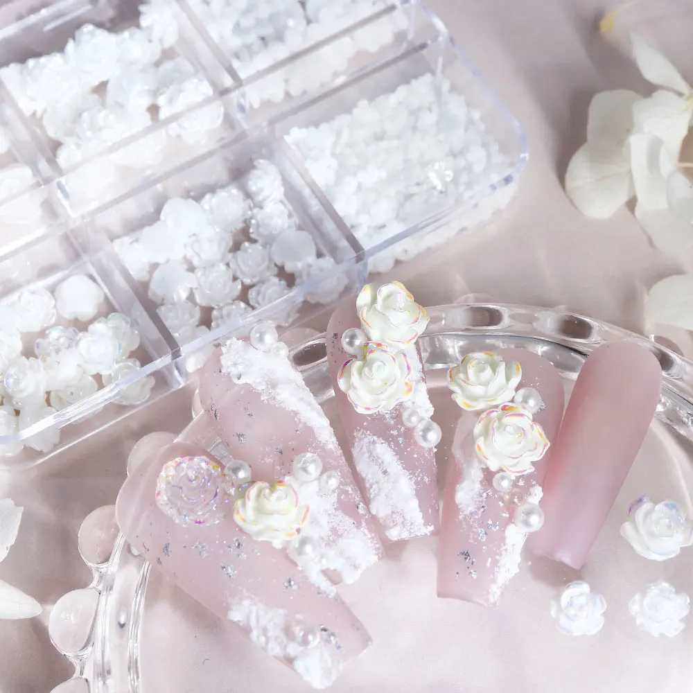 A box of 3D floral nail art decoration tea flower rhinestone crystal nail charm parts for DIY nail accessories in France W240829