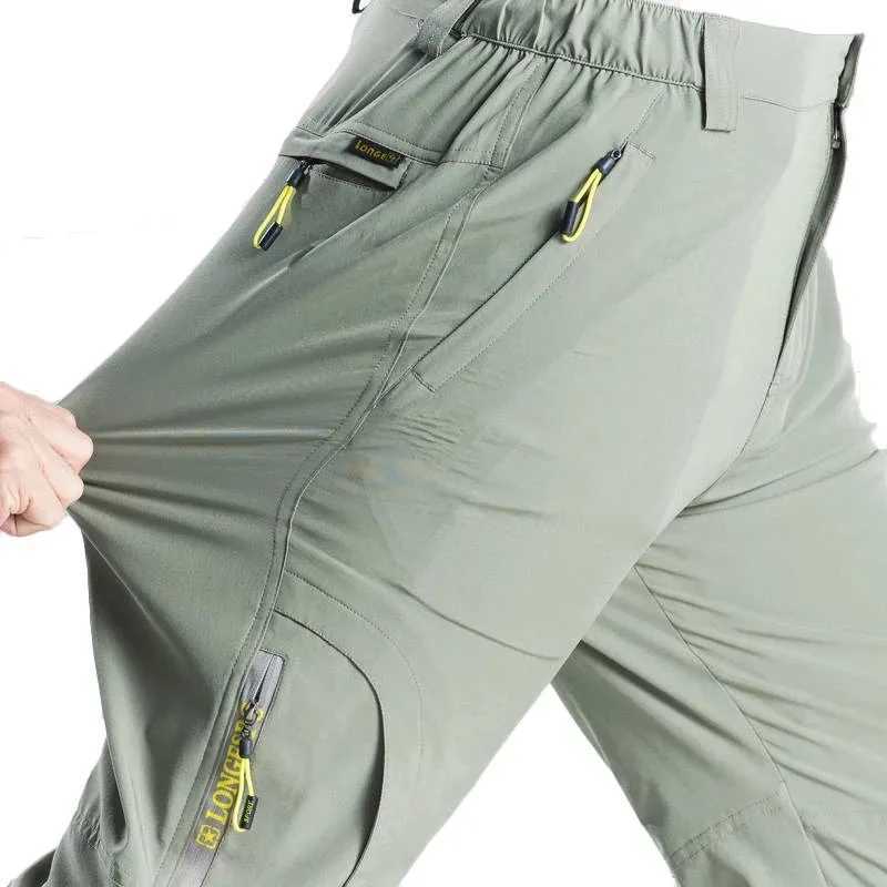 Mens spring elastic waterproof casual pants summer breathable quick drying outdoor mens hiking tactical cargo pants W240829