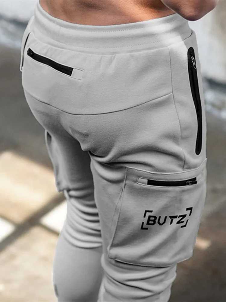 European and American sports cargo pants mens camouflage fitness sports pants running training pants mens fashion zipper Trousers W240829