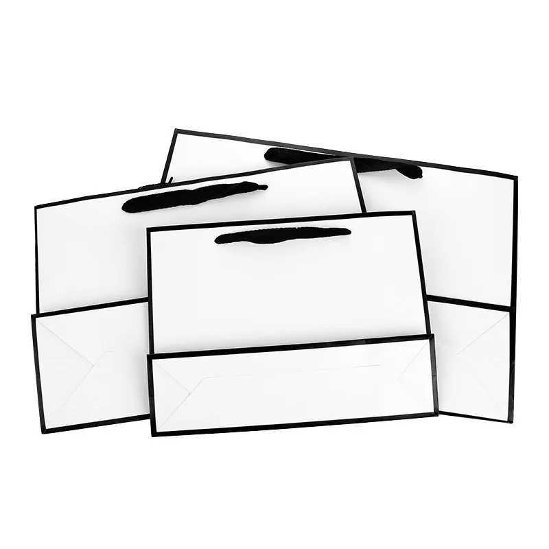 Luxury gift packaging with white cardboard box black border shopping bag portable handbag bow tie party suppliesX240831