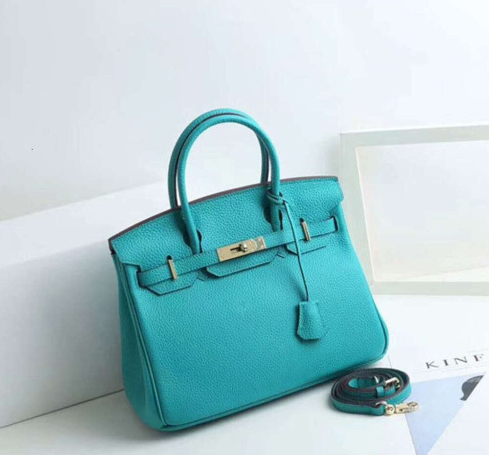 Designer Bags Luxury Fashion Totes Autumn and winter new fashion first layer cowhide litchi pattern bag full leather womens portable one shoulder High quality