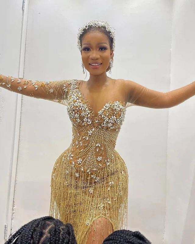 Plu Size Arabic Ao Ebi Gold Uriou Mermaid Prom Dree Eaded Crytal High Split Evening Formal Party Second Reception Gown Dre