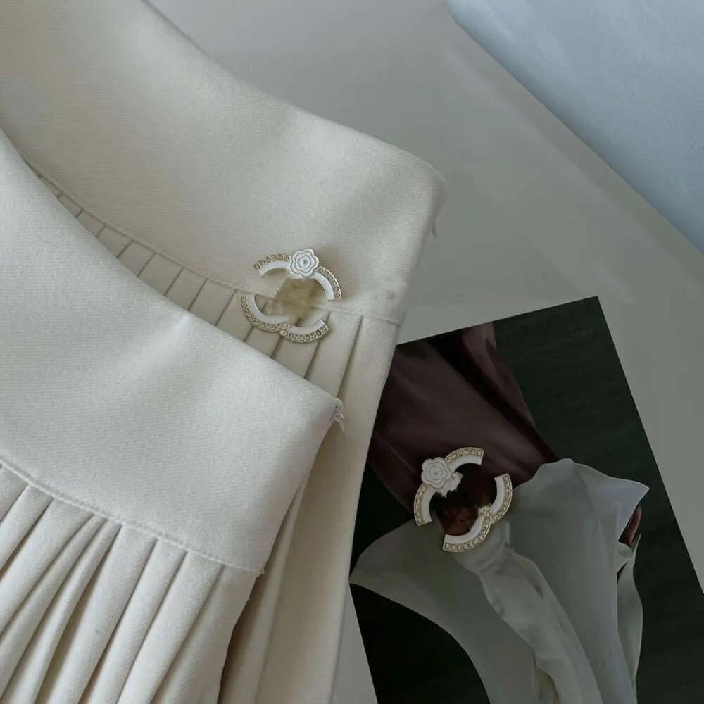 Summer 2 Colors Womens Skirt Metal Letter High Waist Pleated Skirt Anti-Gare Thin Mini Skirts Women