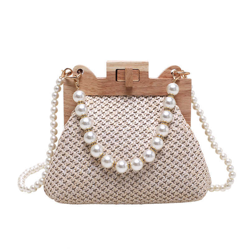 Women s Grass Woven Bag Beach Simple and Sweet Handbag 2024 New Pearl Chain Shoulder 240312
