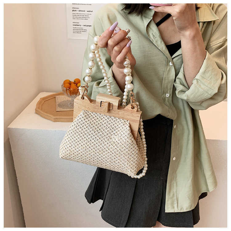 Women s Grass Woven Bag Beach Simple and Sweet Handbag 2024 New Pearl Chain Shoulder 240312