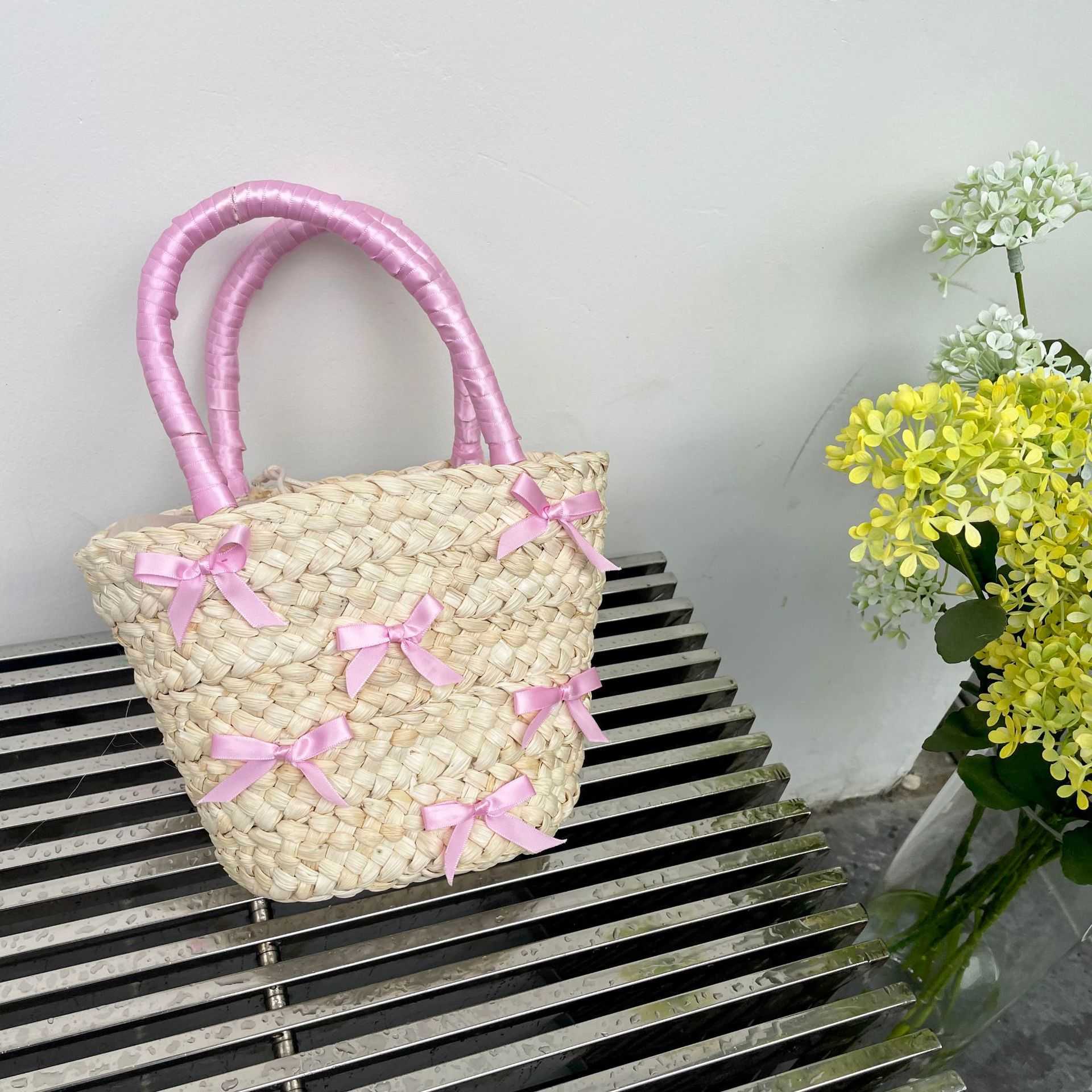Japanese and Korean Bowtie Lafite Grass Woven Bag 2024 Spring Summer New Beach Vacation Handbag Water Bucket 240312