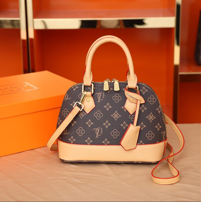 Hot sale Shell bag leather shoulder bag clutch handbag luxury brand designer bag crossbody package messenger bags M53152