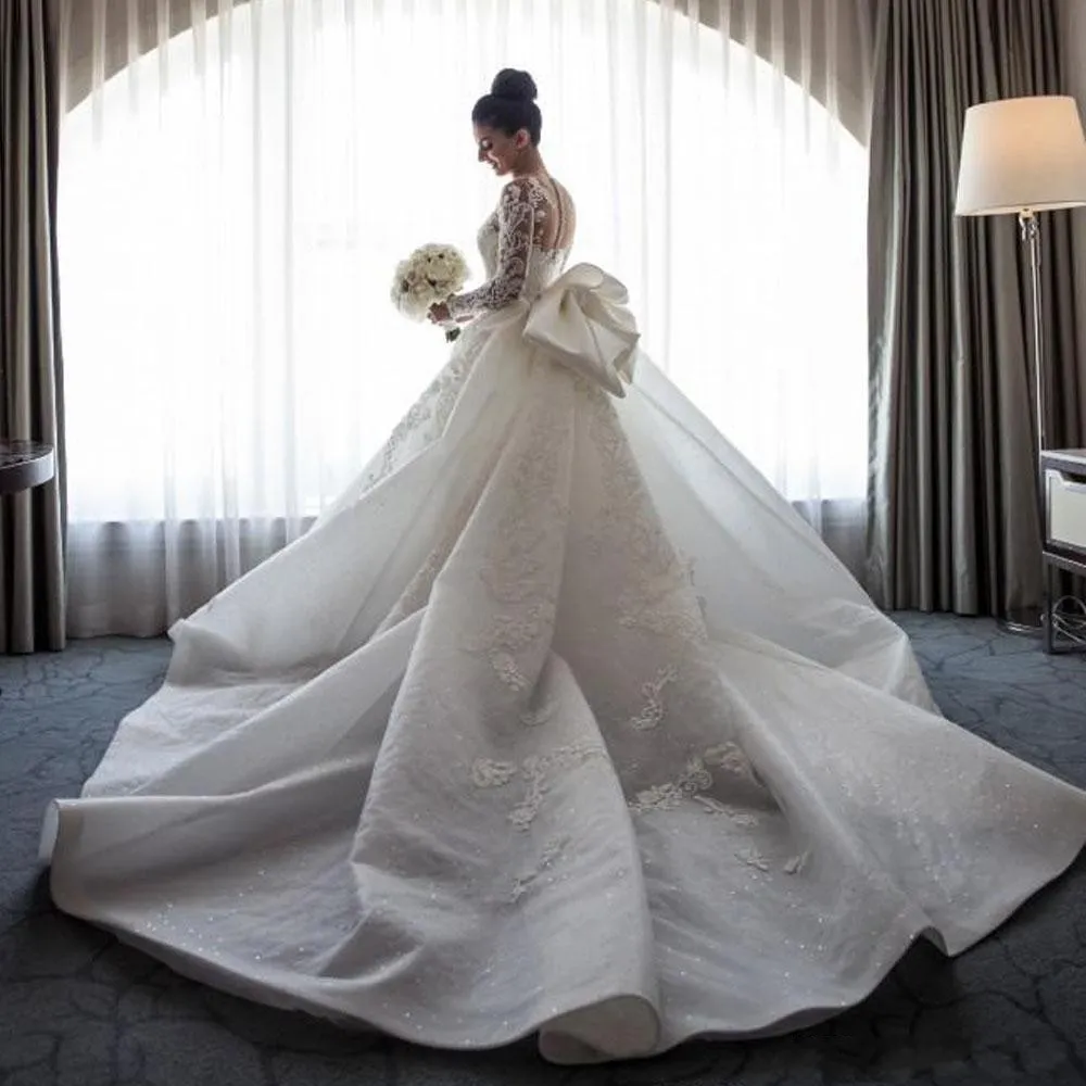 Mermaid Wedding Dresses Sheer Neck Long Sleeves Illusion Full Lace Applique Bow Overskirts Button Back Chapel Train Bridal Gowns 6660305