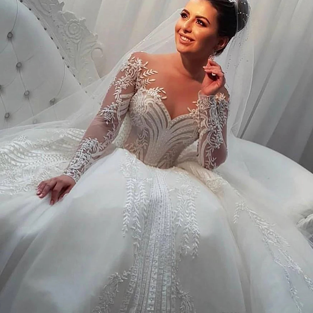 Dubai Princess Wedding Dresses Long Sleeves Lace Appliques Pearls Beaded Ivory A Line Bridal Gowns Sheer Neck Arabic Modern Bride Dress 2024