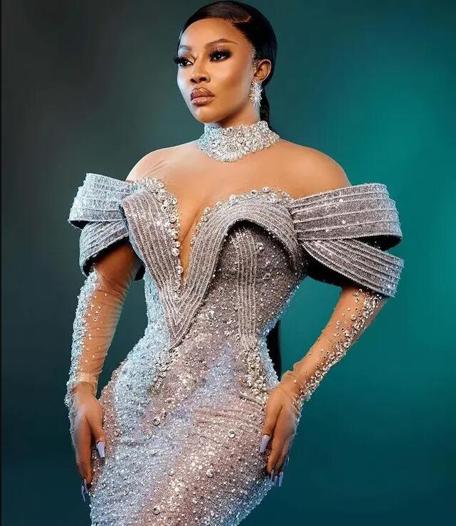 Sier Crystals Beaded Mermaid Evening Dresses African 2024 Aso Ebi High Neck Sheer Long Sleeves Ruffles Formal Party Dress Event Gala Gowns 0319