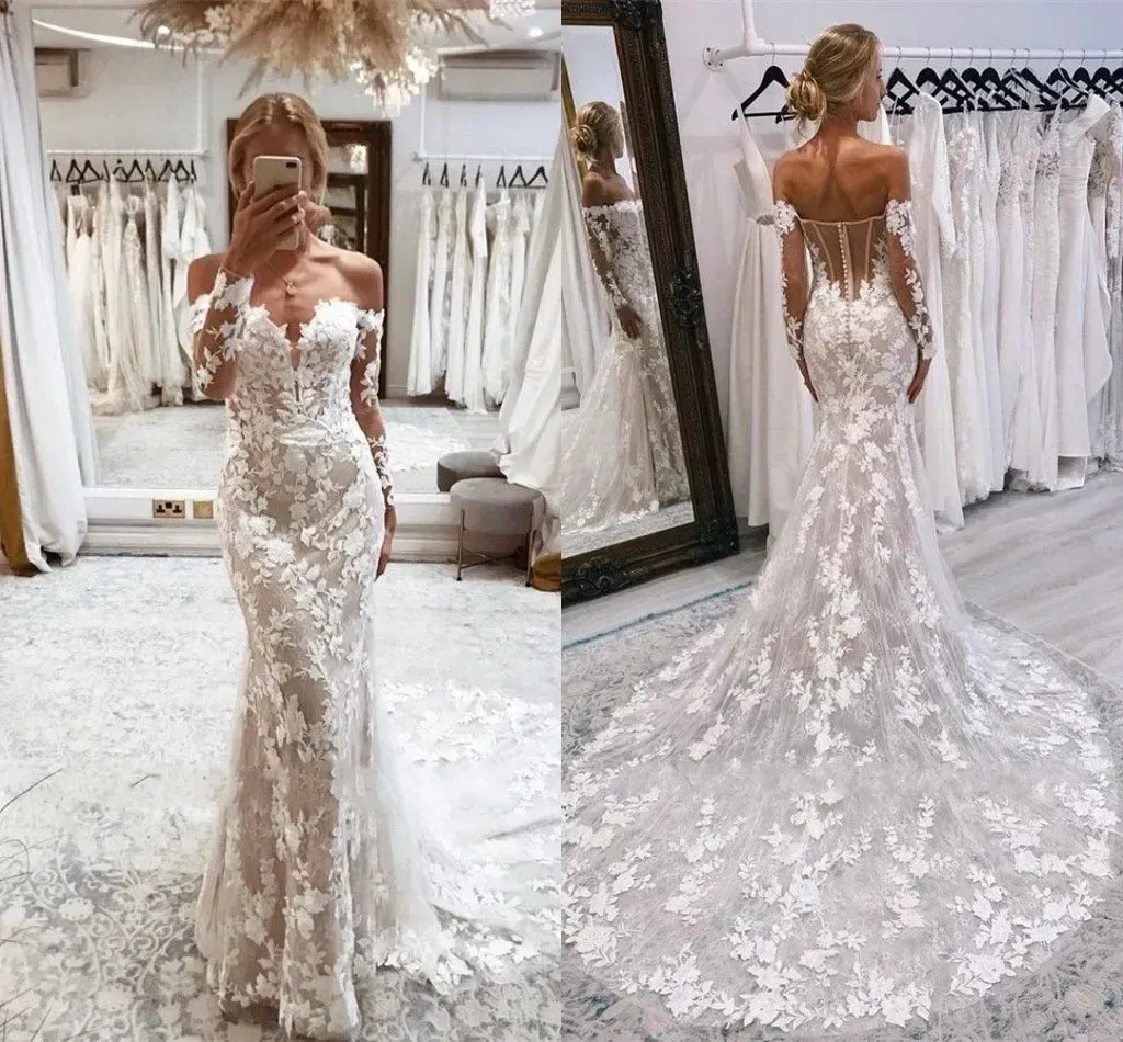 Stunning Mermaid Wedding Dresses New Sexy Backless Off Shoulder Long Sleeves 3D Lace Appliques Bridal Gowns With Button Covered Back Custom Made Bc157