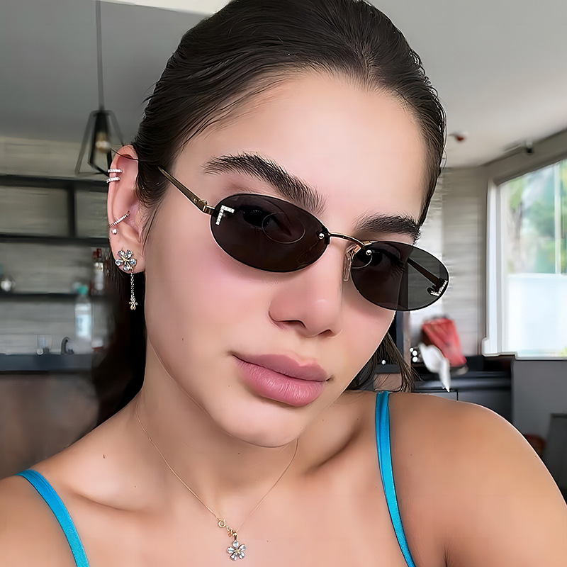 Dia-encrusted Rimless cut edge Oval Cat Eye Sunglasses for Women Fashion high-end Small Frame Trend Sun Glasses Designer Eyewear Free shipping